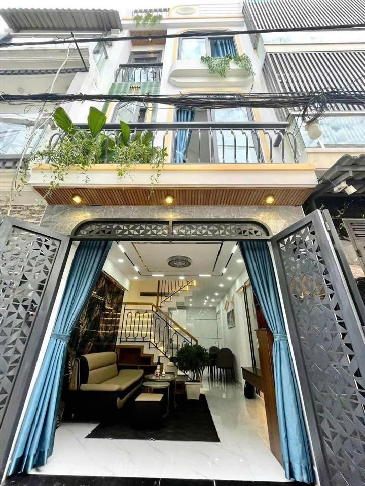 Định cư bán nhà hxh minh phụng, 4 x 14, 3 tầng btct 4 pn có sân thượng, gần chợ bình tiên