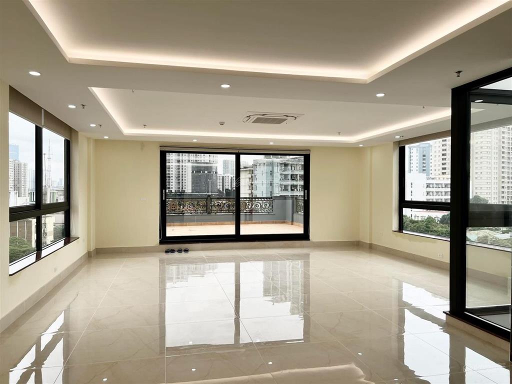 Toà vp mặt phố trần thái tông vỉa hè rộng 3m 7 tầng có hầm dòng tiền 1.5 tỷ/ năm 100m2 mt6m 62 ty