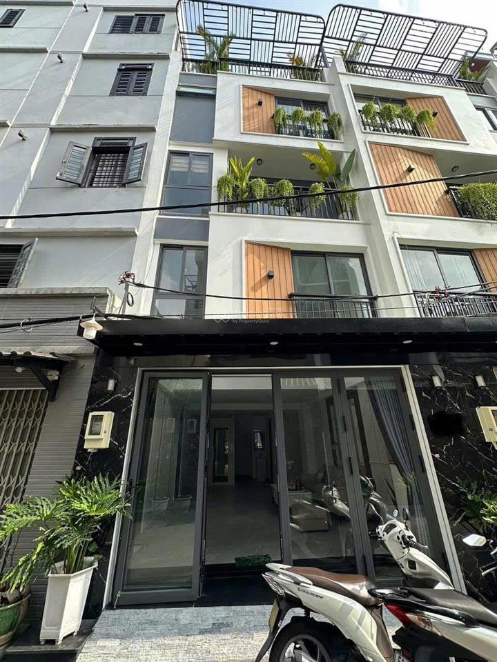 Chia tài sản bán gấp nhà hxh phạm văn chí, 4 x 14, 4 tầng btct, 4 pn, thiết kế hiện đại, cao cấp