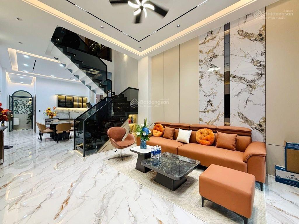 Nhà 4 tầng mặt tiền nguyễn duy cung,100m2,(4,3 x 24)4pn,4wc,sân thượng,có gara ô tô, chỉ có 11.99t