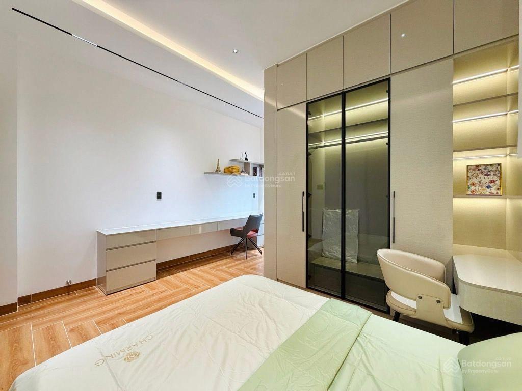 Nhà 4 tầng mặt tiền nguyễn duy cung,100m2,(4,3 x 24)4pn,4wc,sân thượng,có gara ô tô, chỉ có 11.99t