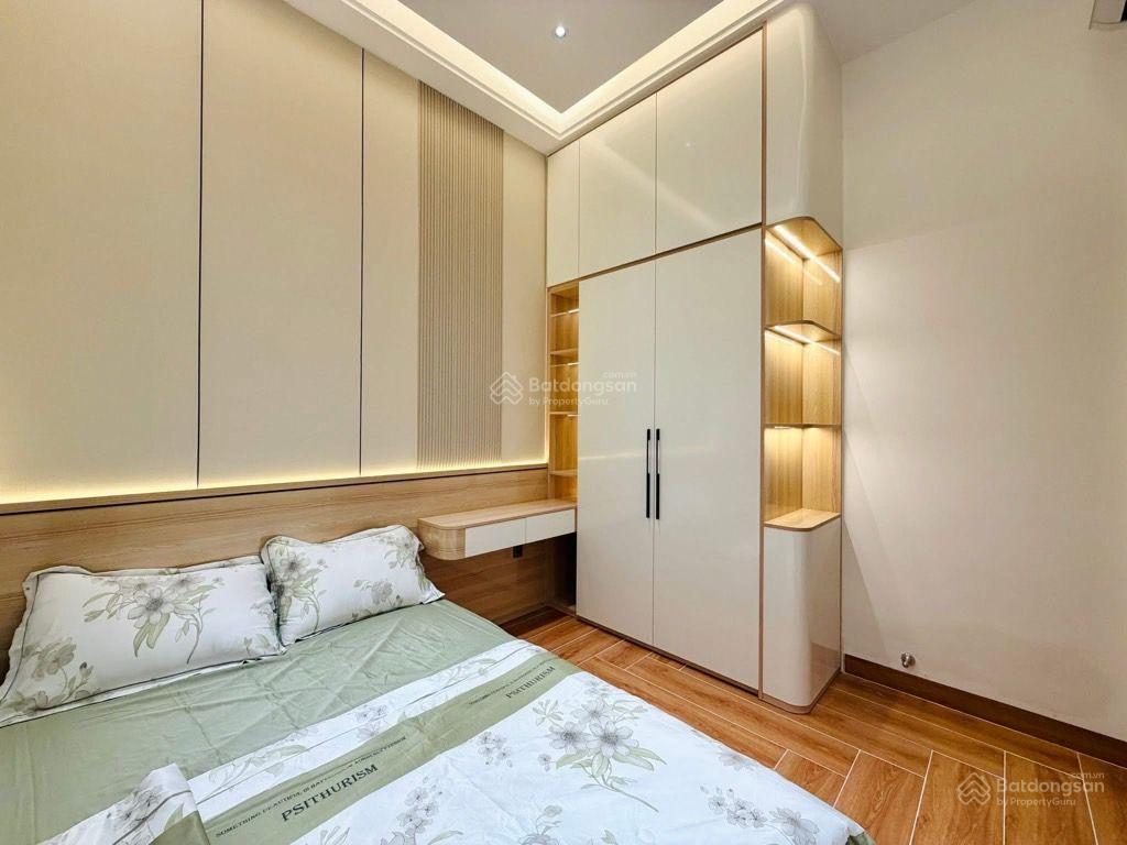 Nhà 4 tầng mặt tiền nguyễn duy cung,100m2,(4,3 x 24)4pn,4wc,sân thượng,có gara ô tô, chỉ có 11.99t