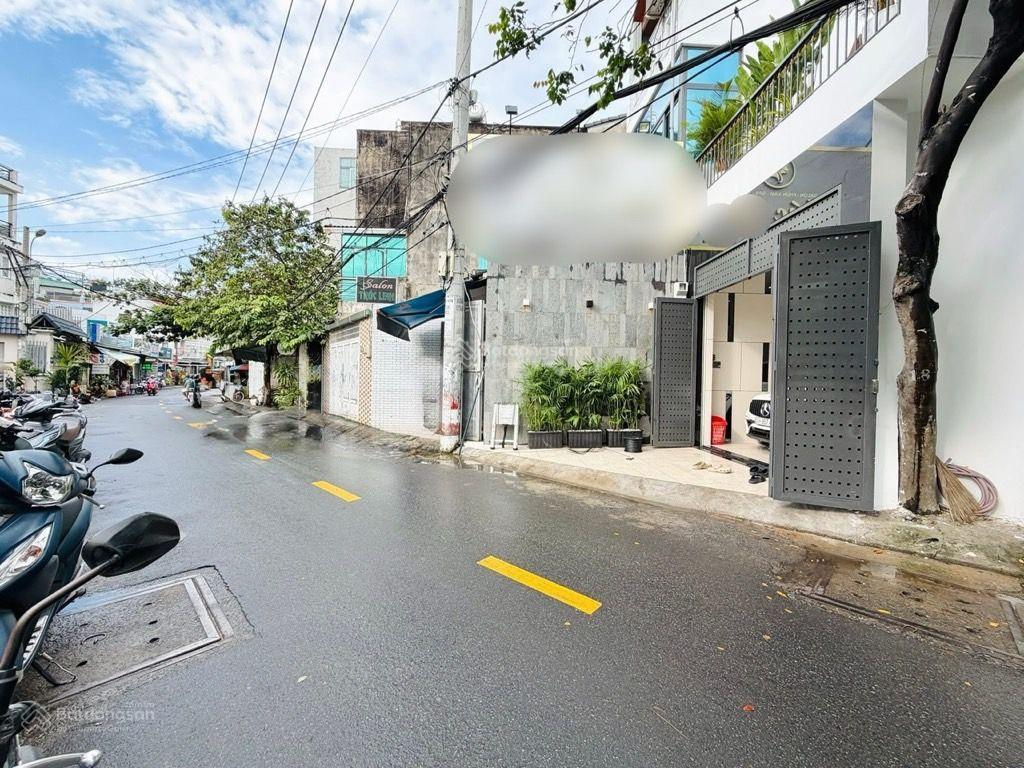 Nhà 4 tầng mặt tiền nguyễn duy cung,100m2,(4,3 x 24)4pn,4wc,sân thượng,có gara ô tô, chỉ có 11.99t