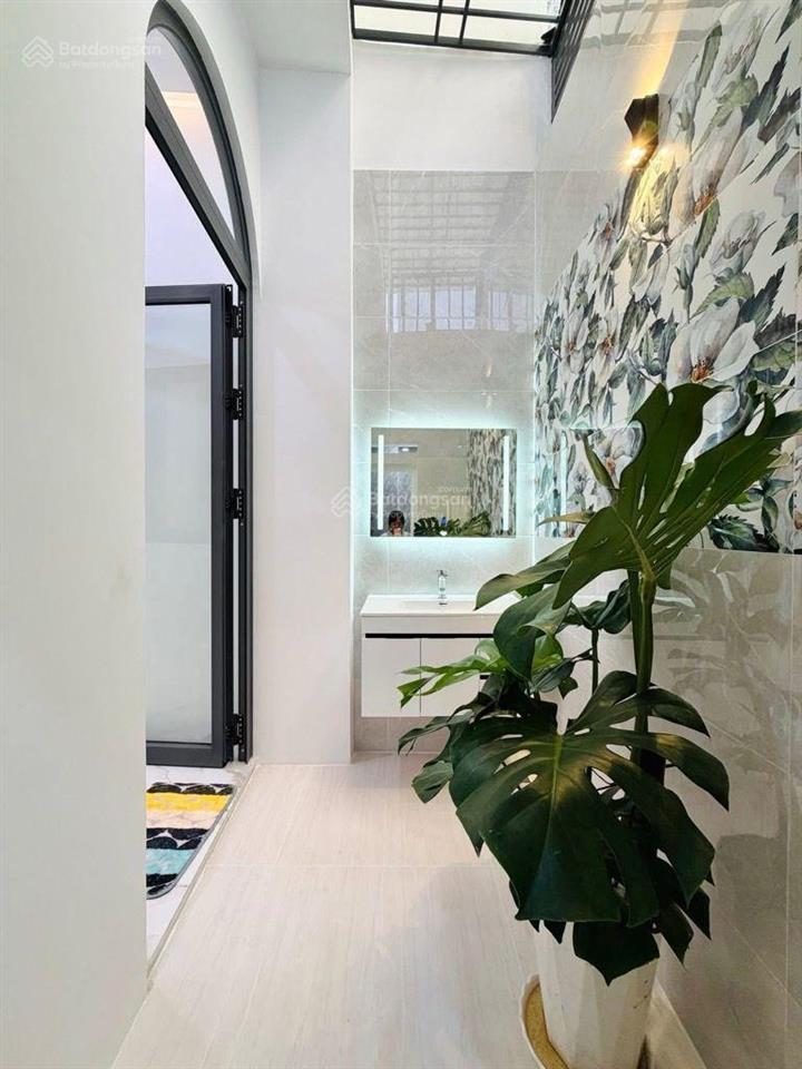 Nhà 4 tầng mặt tiền nguyễn duy cung,100m2,(4,3 x 24)4pn,4wc,sân thượng,có gara ô tô, chỉ có 11.99t