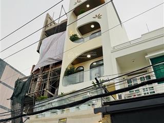 Bán nhà mới xây gò vấp 6 tầng có thang máy gara ô tô hẻm 8m gần sân bay tân sơn nhất