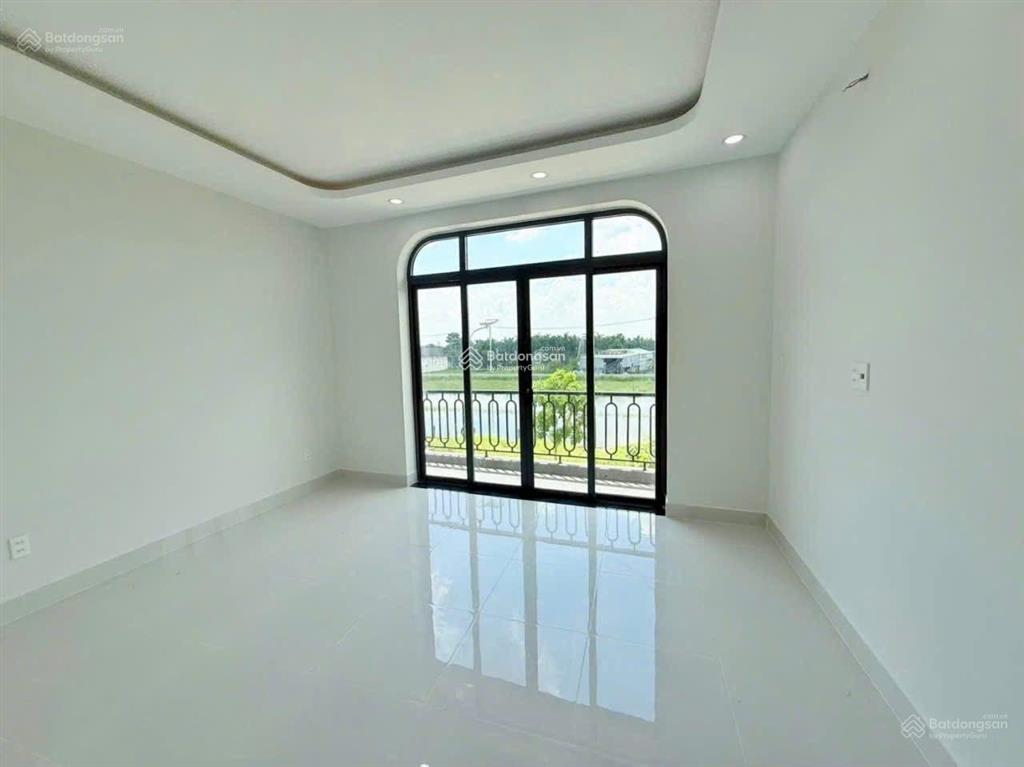 Nhà mới xây 1 trệt 2 lầu, tân phú trung, củ chi. cách bv xuyên á 10p, dt 6x14, giá chỉ 2tỷ5