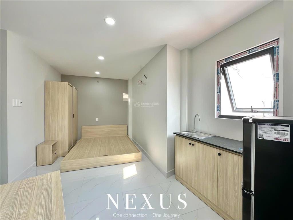 Cho thuê phòng mới 100% ngay dương quảng hàm, full nội thất, sát trường đh văn lang