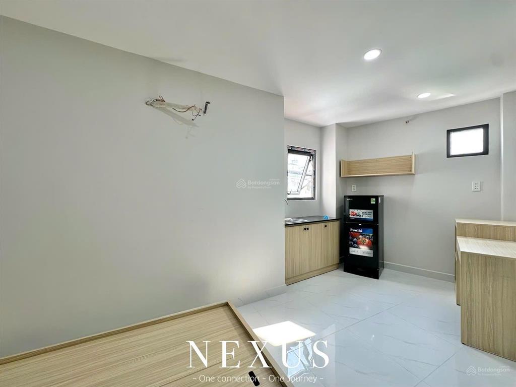 Cho thuê phòng mới 100% ngay dương quảng hàm, full nội thất, sát trường đh văn lang