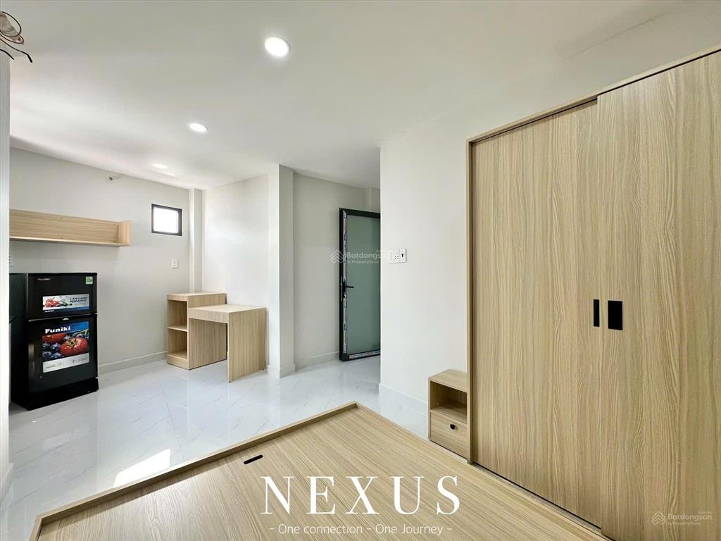 Cho thuê phòng mới 100% ngay dương quảng hàm, full nội thất, sát trường đh văn lang