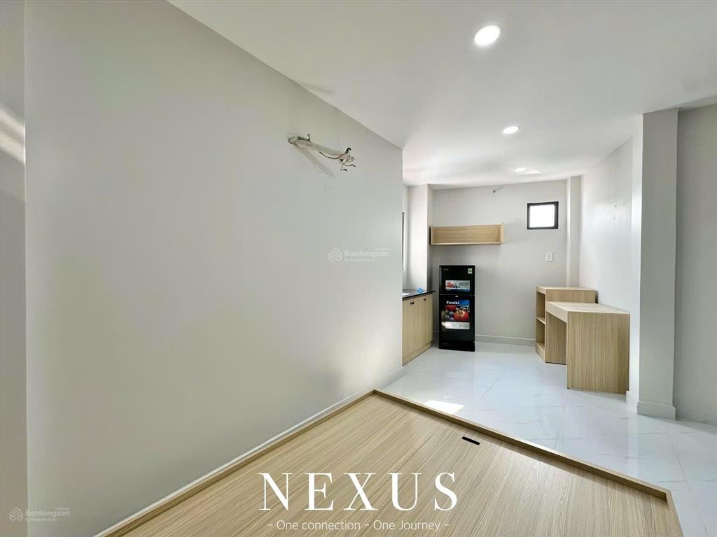 Cho thuê phòng mới 100% ngay dương quảng hàm, full nội thất, sát trường đh văn lang