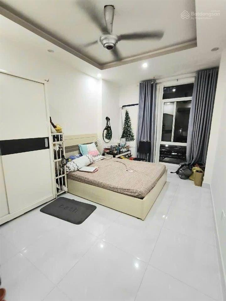 Bán nhà chdv sát mt bùi đình túy 101m2 (10x10,3m) nhà có sân 10pn đang có dòng tiền