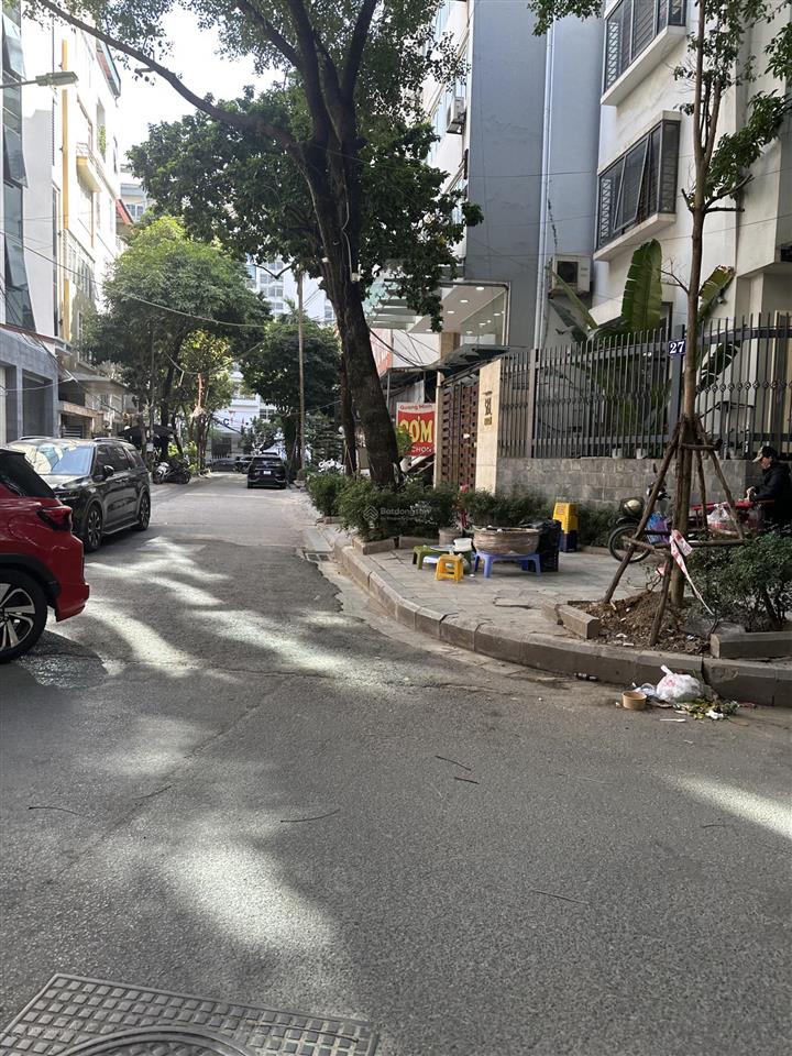 Toà nhà thuộc khu phân lô phố dịch vọng hậu  dt 100m2  vỉa hè ô tô tránh  gần phố  nhinh 50 tỷ