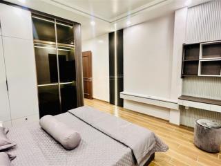 Mẫu nhà thông tầng hiện đại, 4 tầng, có gara oto, nội thất luxury