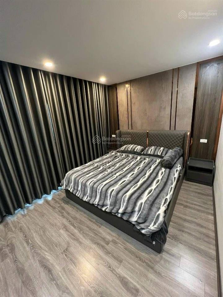 11.5 tỷ bán gấp nhà bát khối 39m2, 6 tầng thang máy, gara ô tô, gần cầu vĩnh tuy, full nội thất
