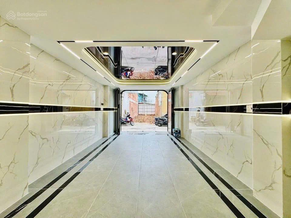 Định cư nước ngoài bán hxh hậu giang,4 x 22, 6 tầng btct, 6 pn, 6wc có sân thượng, nội thất cao cấp