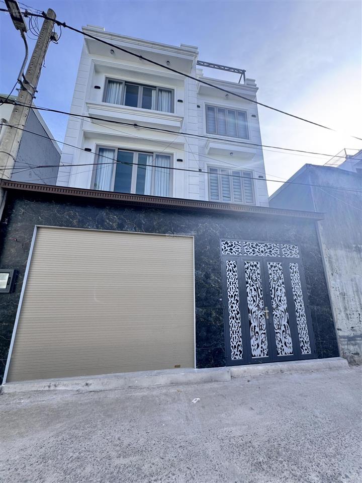 Bán nhà mới xây ngang 7,6m đối diện gigamall phạm văn đồng, thủ đức. gara ô tô riêng.
