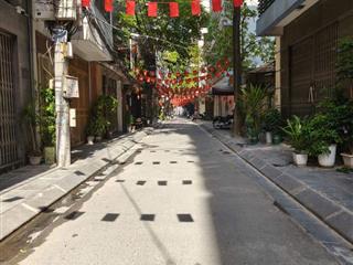 Nhà trường chinh  đối diện ngã tư sở  ngõ thông bàn cờ  ô tô đỗ cửa  50m2, mặt tiền 4m