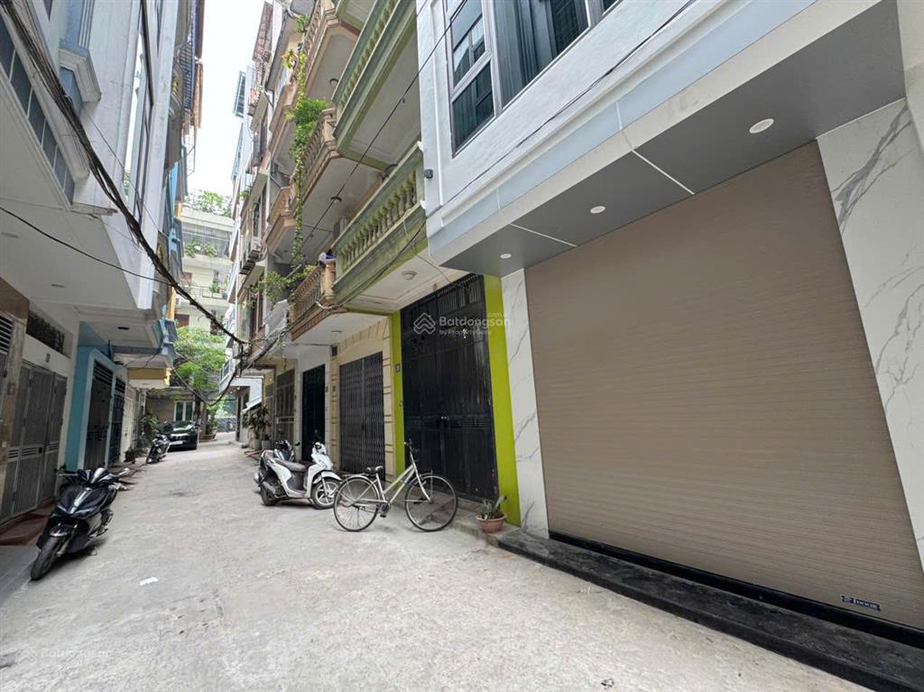 Phân lô oto tránh đỗ. thang máy. chỉ hơn 15 tỷ. chùa láng đống đa. dt 38m2x5t đẹp. 2 mặt trc sau.