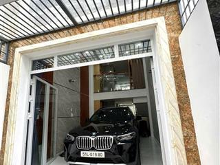 Nhà hxh thang máy trệt lửng 2 lầu  4pn  phường 6  gò vấp