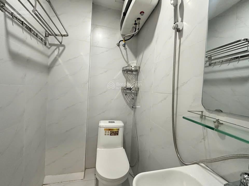 Bán nhà hào nam trung tâm đống đa, 8 tầng thang máy, dòng tiền gần 2 tỷ mỗi năm, giá 24,5 tỷ