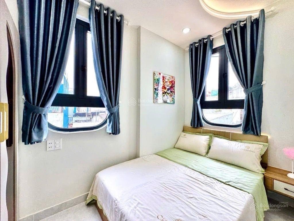 Hiếm!!!! nhà mới 5 tầng btct căn góc  xe ô tô ngay hàng xanh sát q1  ngân hàng hỗ trợ 70%