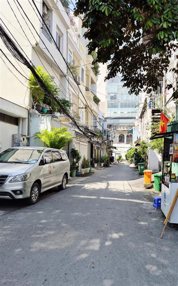 Nhà không mua tiếc, hẻm xem hơi phường 25 bình thạnh, dt 89m, gần đh ngoại thương, xây chdv 8 tầng