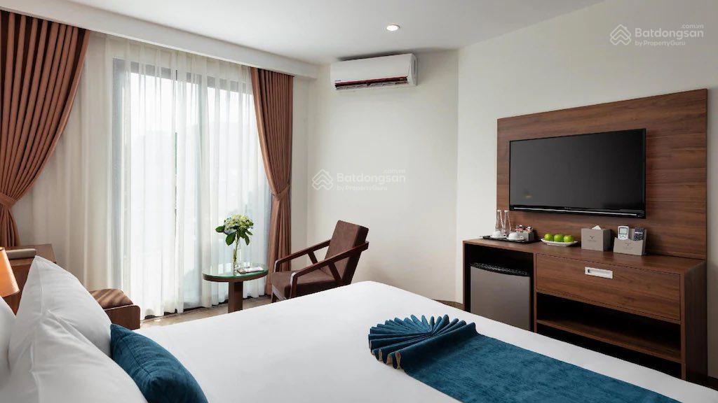 Bán ks 8 t hiện đại, chỉ 2 nhà ra mặt phố kim mã, dòng tiền 400 tr/tháng, mặt tiền 9m, nở hậu, gpxd