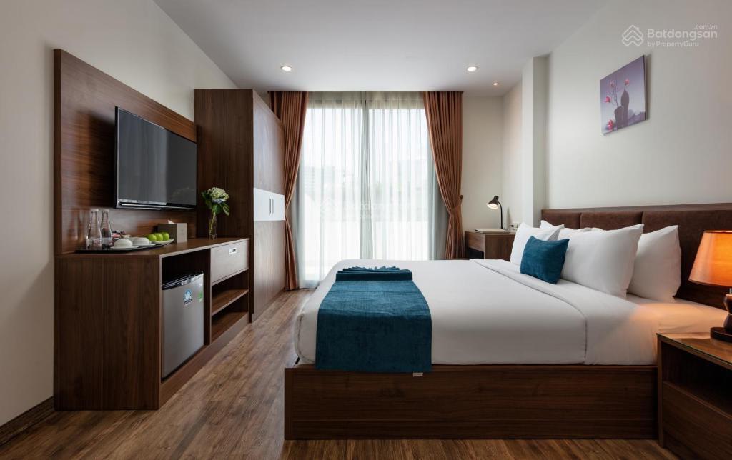 Bán ks 8 t hiện đại, chỉ 2 nhà ra mặt phố kim mã, dòng tiền 400 tr/tháng, mặt tiền 9m, nở hậu, gpxd