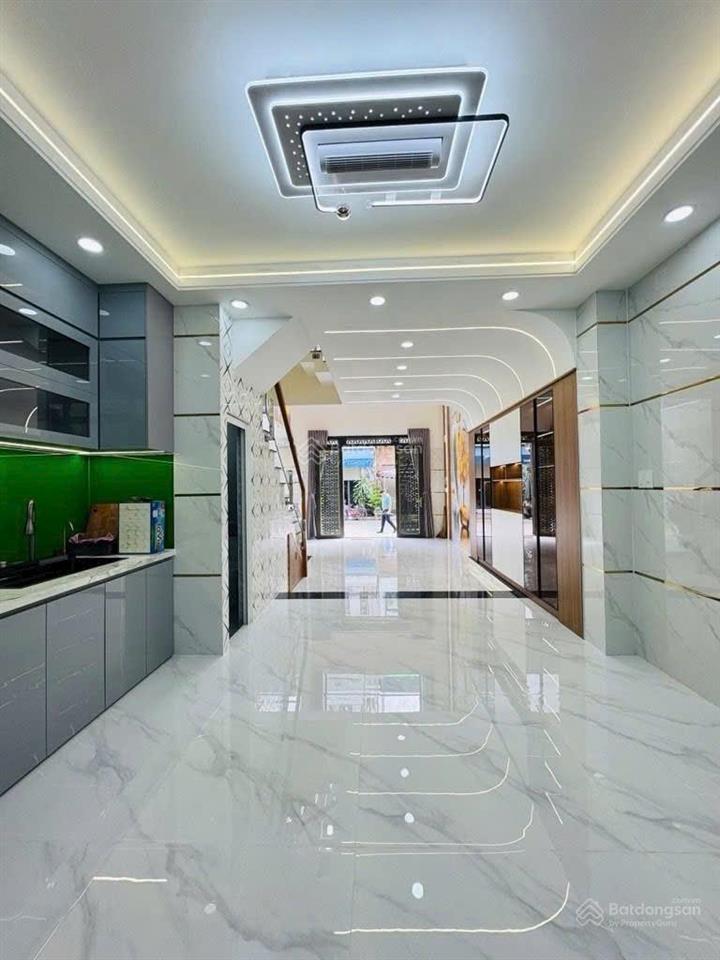 Nhỉnh 7ty nhà 5 tầng bình trị đông bình tân dt 4,5x13m đường 18m