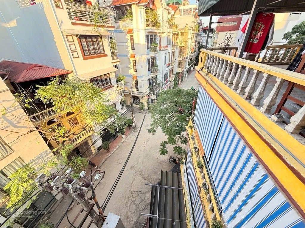 Bán nhà mặt ngõ phùng chí kiên  phân lô  oto tránh  56m  ô chờ thang máy  giá tốt đầu tư