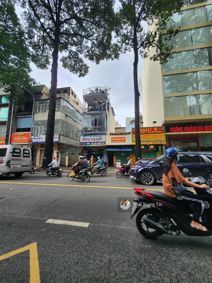 Cần tiền bán nhà mt triệu quang phục p11 q5. ( 4 x 14,5m ) 4 lầu mới đẹp giá 18,5 tỷ