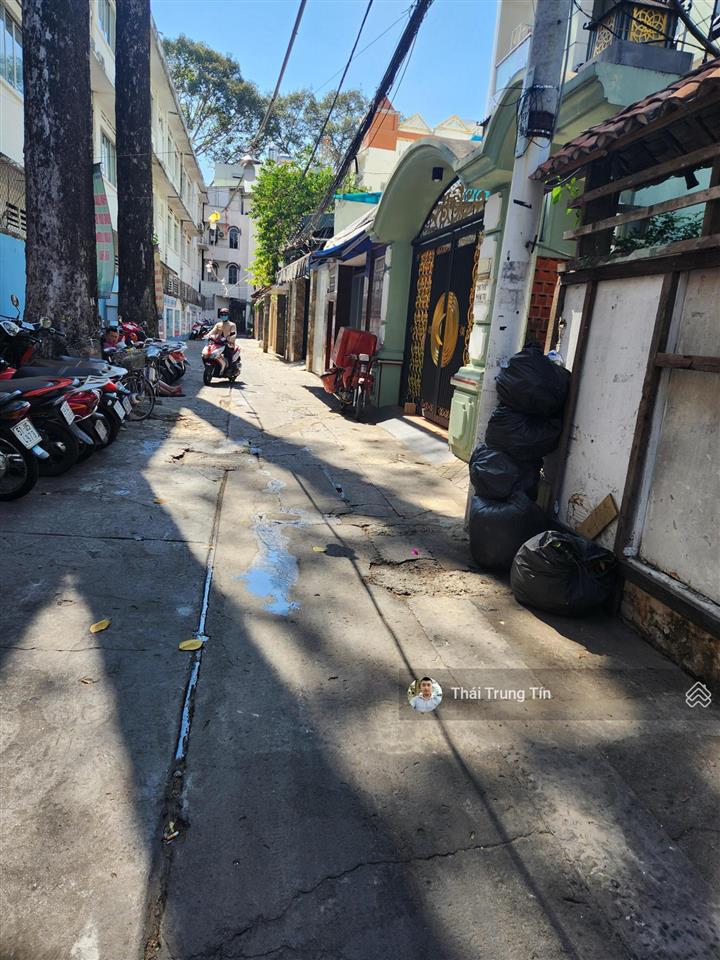 Cần tiền bán nhà mt triệu quang phục p11 q5. ( 4 x 14,5m ) 4 lầu mới đẹp giá 18,5 tỷ