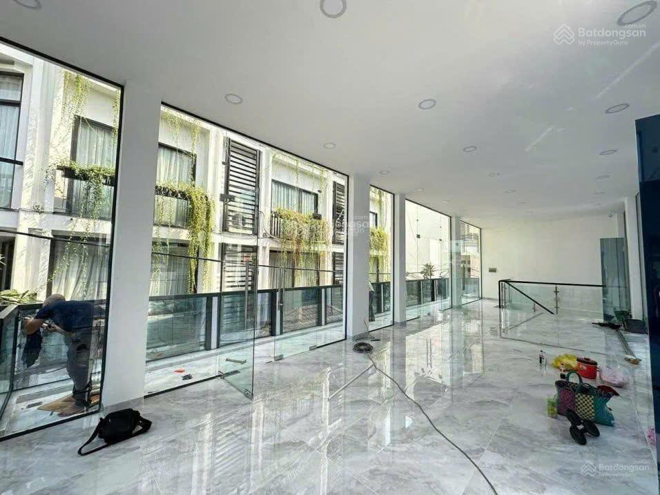 21 + 23a thạch thị thanh, tân định, quận 1. dt 9.5x17m giá 66 tỷ tl