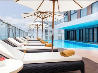 Bán khách sạn 4 sao , 98 phòng kd + 1 penthoues , mặt đường phố tây gần biển trần phú , lộc thọ
