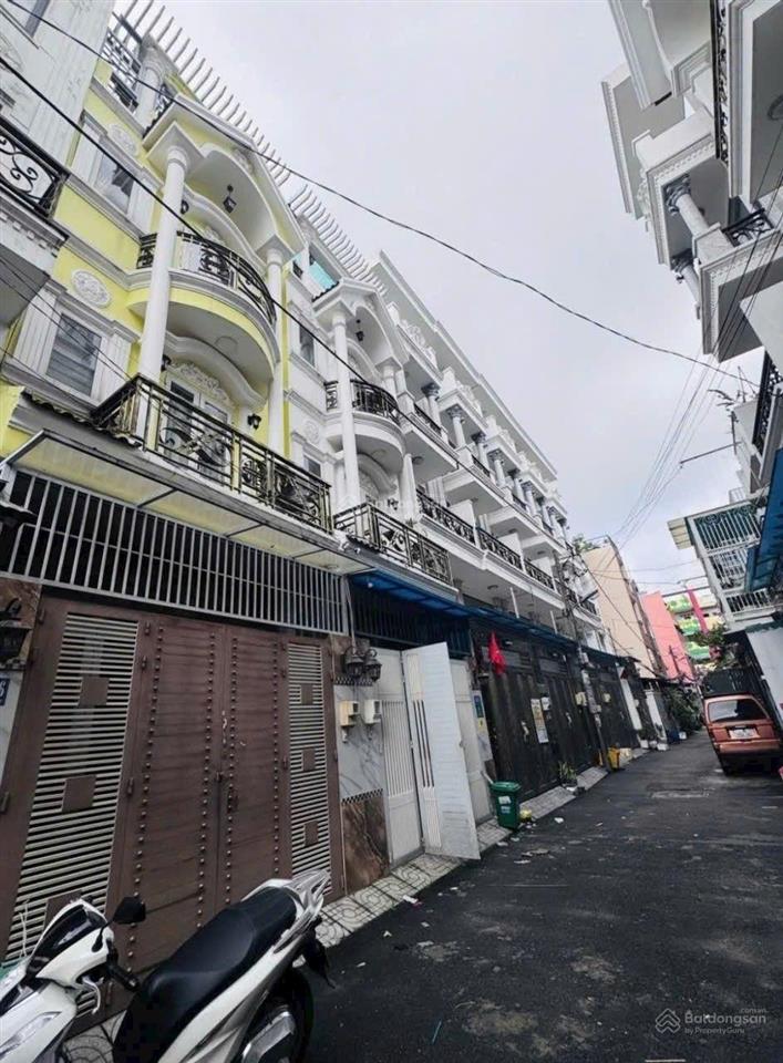 Căn nhà phố khu phân lô đồng bộ  hẻm xe hơi  dt 4m x13m  3 tầng  4 phòng ngủ  5wc