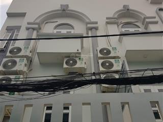 Nhà hxh 128 huỳnh tấn phát 7x12m 4 tầng 12 phòng thu nhập 40 triệu/tháng