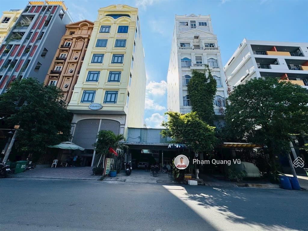 Bán toà chdv cao cấp mặt tiền đường 24m quận 7 dt sàn 1172m2 kc hầm + 08 tầng  hđt 300tr/th  50tỷ