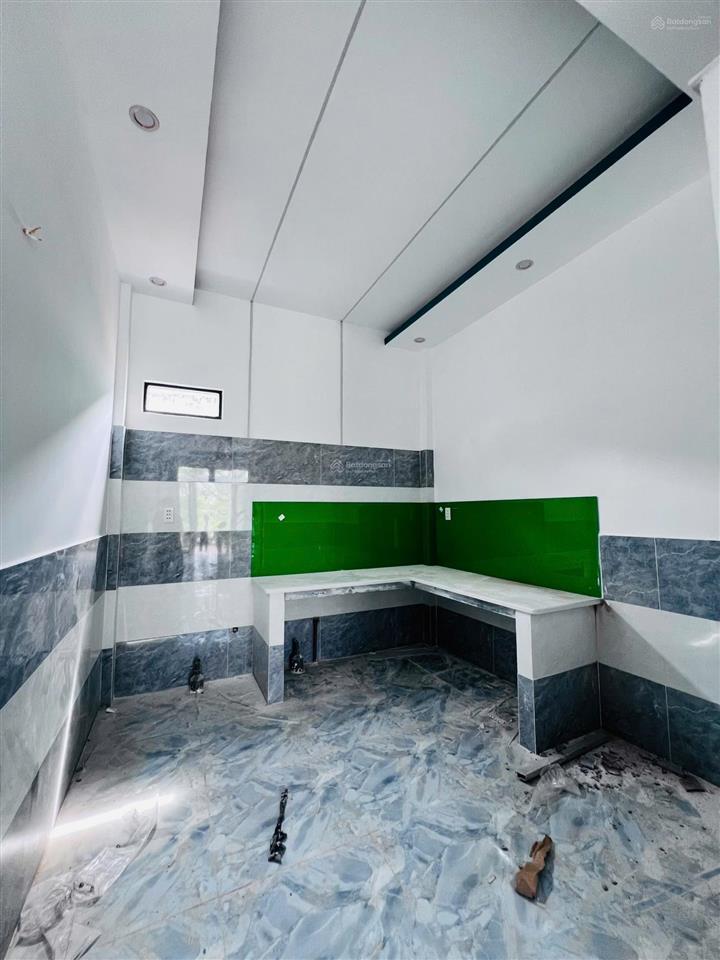 Nhà mới xây, nhà gần chợ, hóc môn ngay kdc đông đúc, sổ hồng 4x12m, nhà đẹp y hình