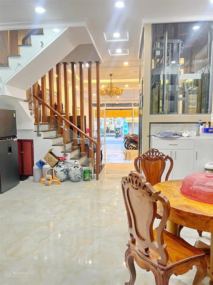 Thơm  5x19m, 5 tầng mới đẹp mặt tiền kd mai văn vĩnh q7 giá 23 tỷ