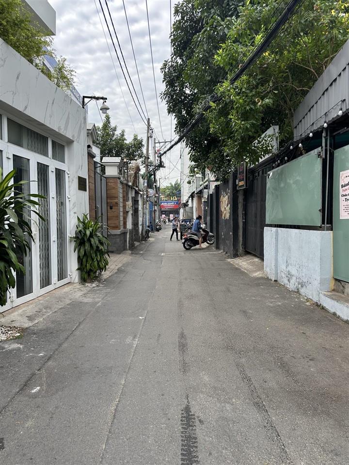 Nhà bán chợ hạnh thông tây, gần quang trung, hẻm xe hơi, ngang 4,7m  nở hậu.  0932 127 ***