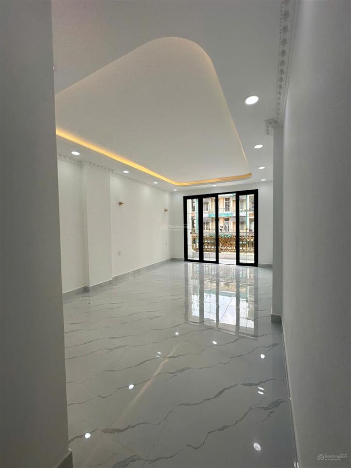 Nhà 4 lầu đẹp 100% (4x19) đường 10m ngay mega bình phú q.6