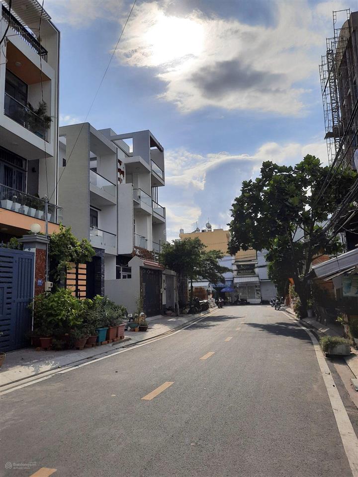 Nhà 3 lầu đẹp  có thang máy (80m2) đường lớn 12m q.6