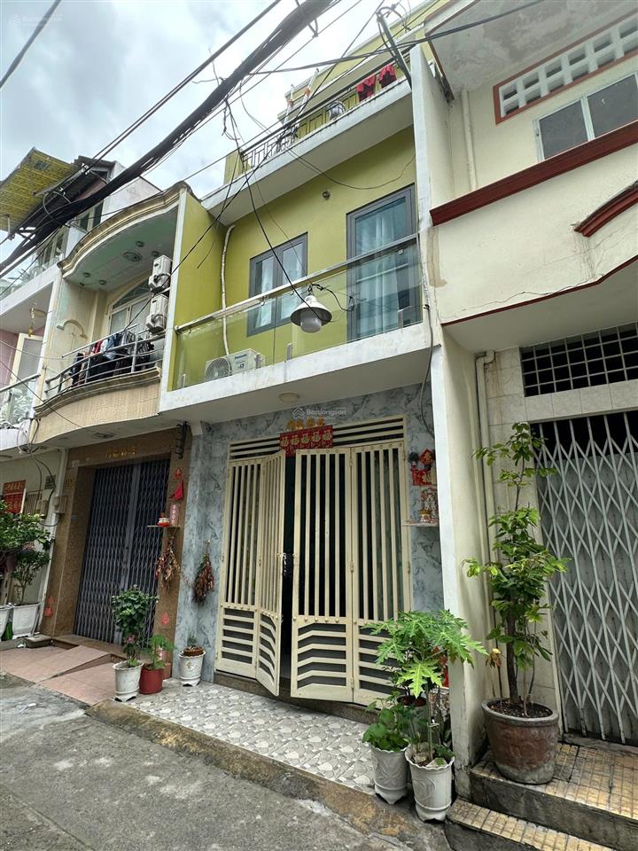 Nhà mới 2 lầu ngay chợ cây gõ đường minh phụng