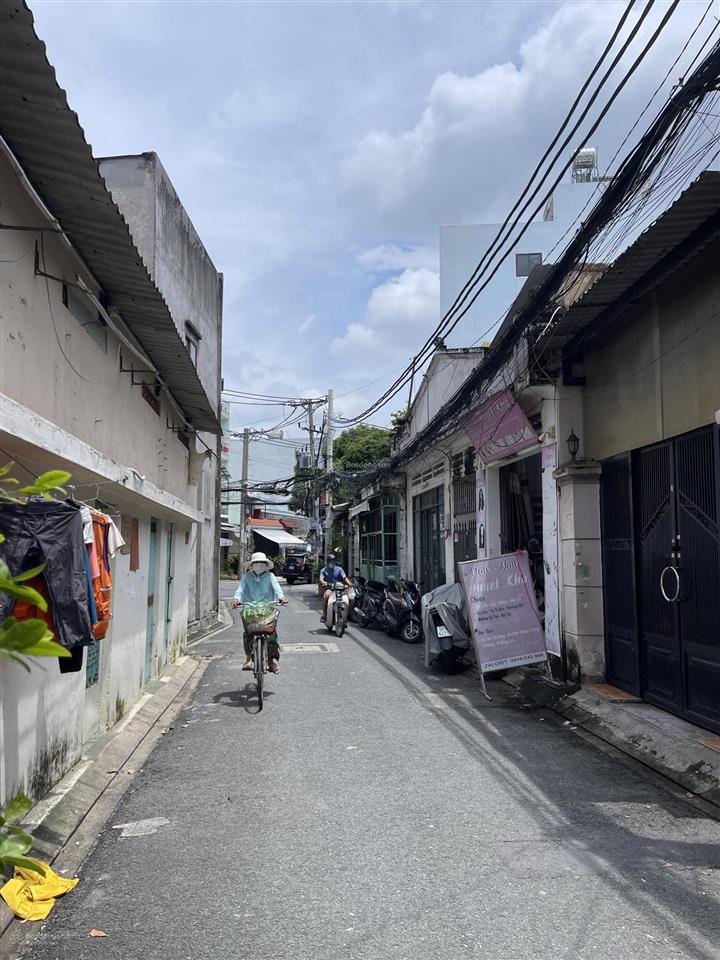 Bán nhà hxh trần thị trọng(cống lỡ cũ) p15  tân bình(dt 8,7x 29 =238m2) hiện có 12 phòng trọ