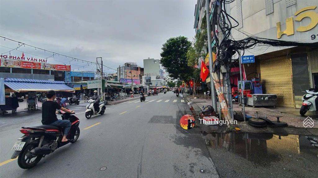 Toà nhà 6 lầu mặt tiền phạm văn hai ngay chợ  dt 102m2  dòng tiền 130 triệu  giá chỉ 29 tỷ