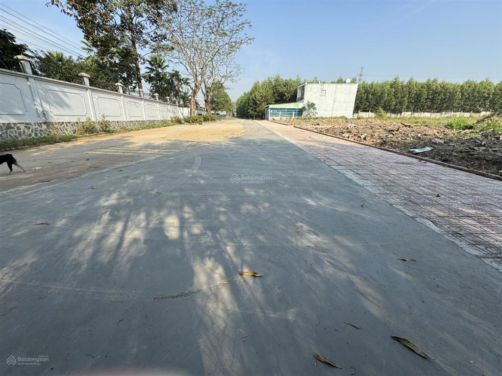 Đất thổ cư 100% ngay điểm cầu long hưng về q9 chỉ 6km, gần chợ, đối diện 2 căn biệt thự trong ảnh