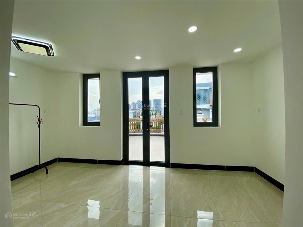 Cho thuê tòa nhà 5x20m, hầm 3 lầu, nội thất hiện đại giá 50tr/tháng  0931 254 ***