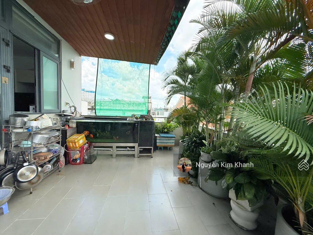 Hxh sát bên phan đăng lưu  103m2 6 tầng thang máy  ngang 9m  dt sàn 600m2  kts thiết kế riêng