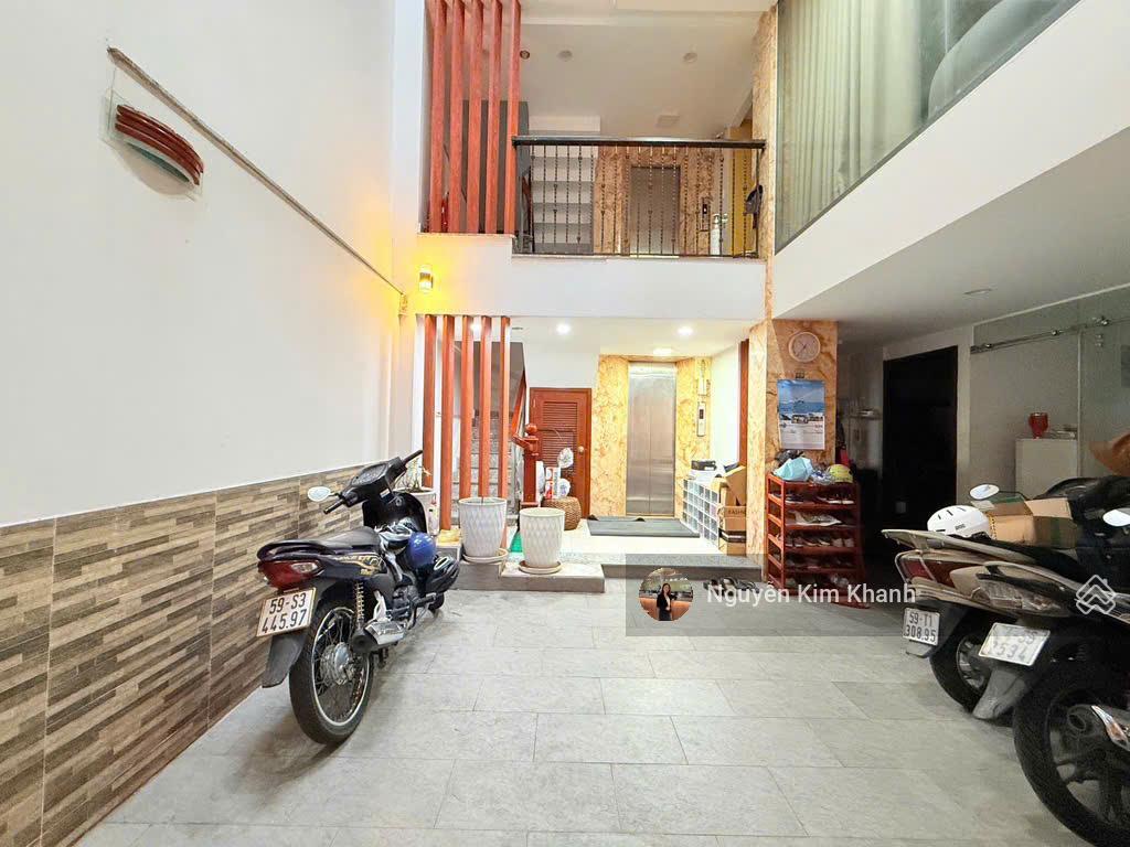 Hxh sát bên phan đăng lưu  103m2 6 tầng thang máy  ngang 9m  dt sàn 600m2  kts thiết kế riêng