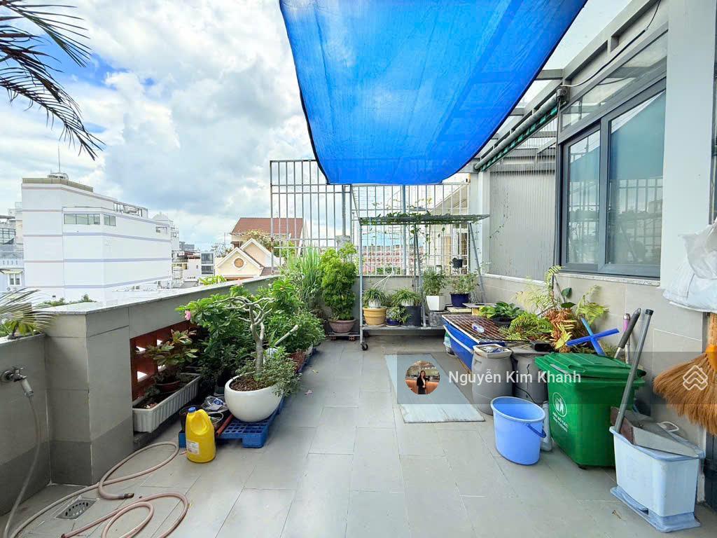 Hxh sát bên phan đăng lưu  103m2 6 tầng thang máy  ngang 9m  dt sàn 600m2  kts thiết kế riêng